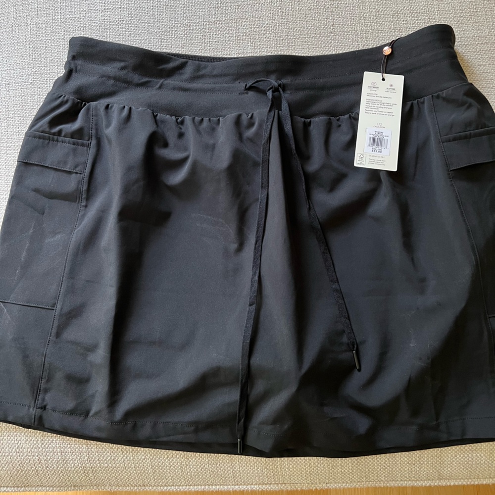 New with tags CALIA Journey Cargo Skort.  Black size XL